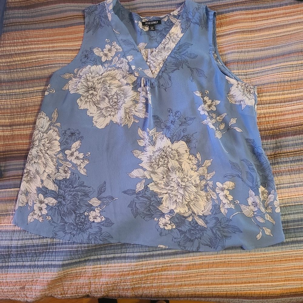 Sleeveless light blue flowery top